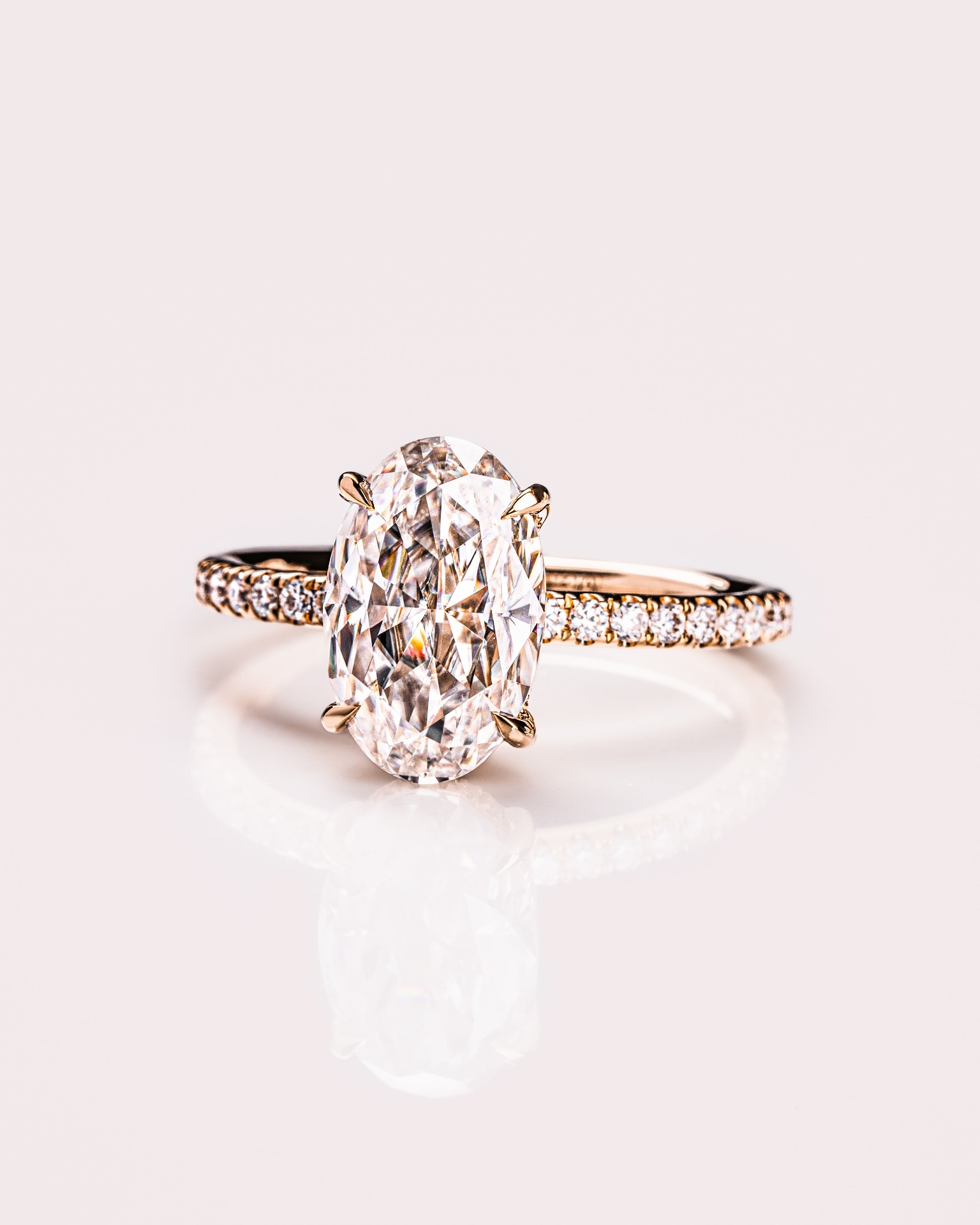 Loose natural and lab-grown diamonds on burgundy velvet